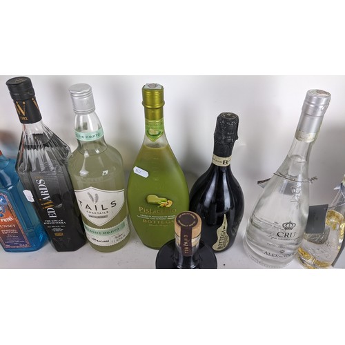 271 - A selection of alcohol to include Bombay Bramble gin, Hyke gin, Pistacchio Bottega, Edwards vodka an... 