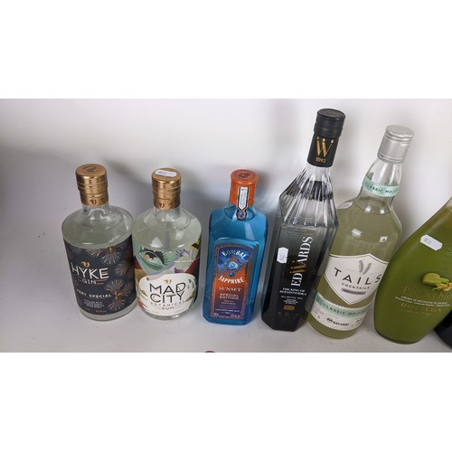 271 - A selection of alcohol to include Bombay Bramble gin, Hyke gin, Pistacchio Bottega, Edwards vodka an... 