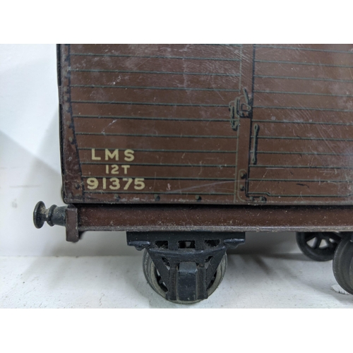 35 - Four Bassett – Lowke hard top cargo train carriages (LMS 12T 91375) 
Location:3.1
If there is no con... 