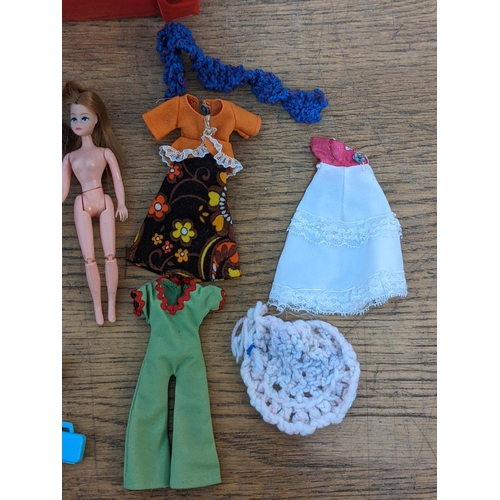 47 - Four vintage Palitoy Pippa dolls with jointed legs and other clothing and accessories 
Location:RAM
... 