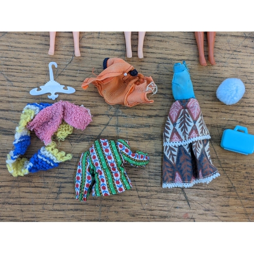 47 - Four vintage Palitoy Pippa dolls with jointed legs and other clothing and accessories 
Location:RAM
... 