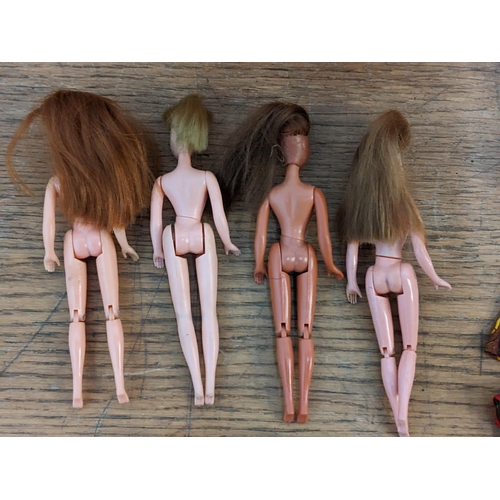 47 - Four vintage Palitoy Pippa dolls with jointed legs and other clothing and accessories 
Location:RAM
... 