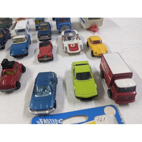 55 - A collection of Corgi model vehicles to include a Lunar Buggy, a Smith's Karrier van, a Ferrari Dayt... 