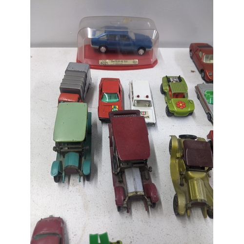 56 - A collection of Matchbox model vehicles to include a Baja Buggy, a Mercury Police car, a Renault 17 ... 