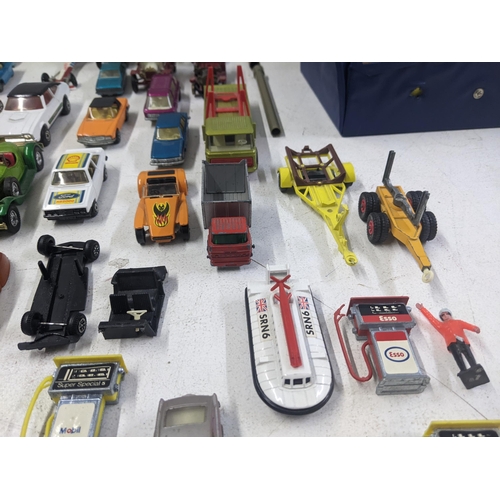 56 - A collection of Matchbox model vehicles to include a Baja Buggy, a Mercury Police car, a Renault 17 ... 