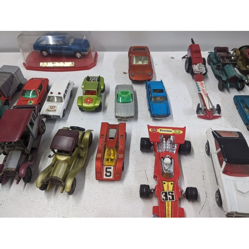 56 - A collection of Matchbox model vehicles to include a Baja Buggy, a Mercury Police car, a Renault 17 ... 