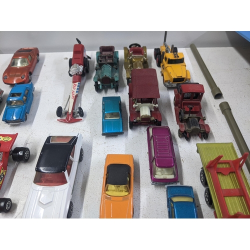 56 - A collection of Matchbox model vehicles to include a Baja Buggy, a Mercury Police car, a Renault 17 ... 