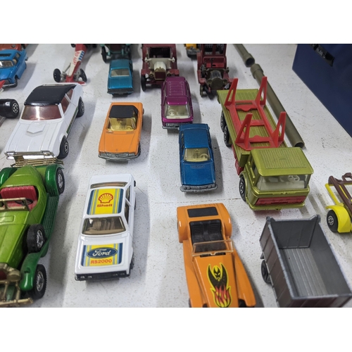 56 - A collection of Matchbox model vehicles to include a Baja Buggy, a Mercury Police car, a Renault 17 ... 