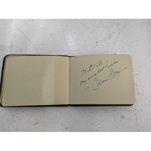 66 - A vintage autograph book containing a list of autographs to include Richard Attenborough, Bette Davi... 