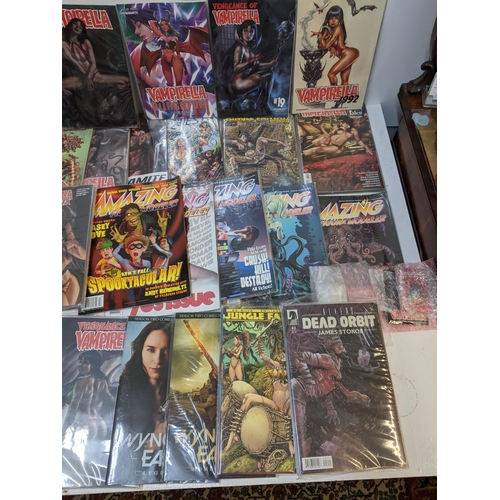 68 - A collection of modern comics to include several editions of Vampirella, Jungle Fantasy, Amazing Fig... 