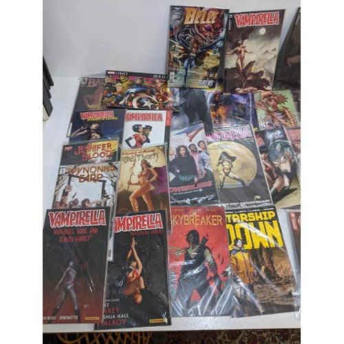 68 - A collection of modern comics to include several editions of Vampirella, Jungle Fantasy, Amazing Fig... 