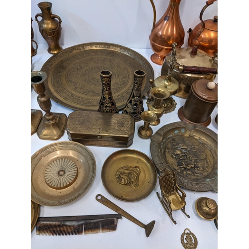 13 - A collection of metalware to include two brass kettles, two trays, a copper water jug and kettle, a ... 