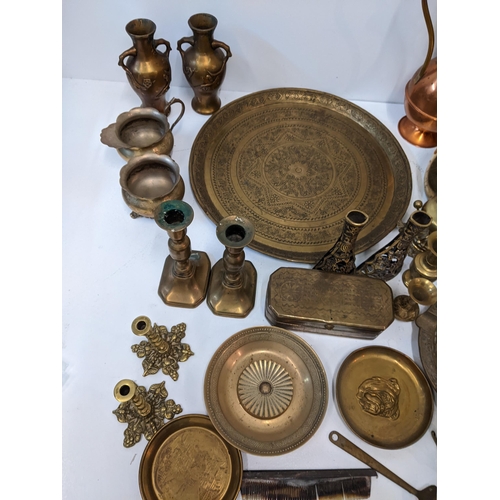 13 - A collection of metalware to include two brass kettles, two trays, a copper water jug and kettle, a ... 