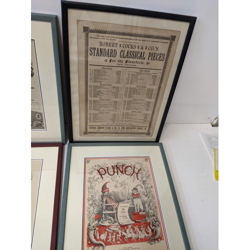 17 - A group of framed and glazed vintage adverts together with a Spink Orders, Decorations and Medals bo... 