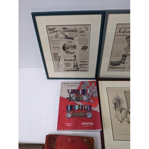 17 - A group of framed and glazed vintage adverts together with a Spink Orders, Decorations and Medals bo... 