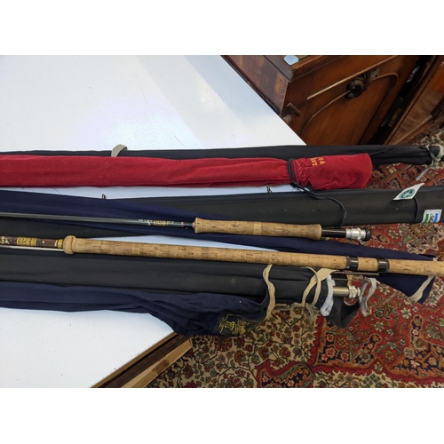 19 - A collection of fishing rods to include a Hardy's example and others, together with a silver plated ... 