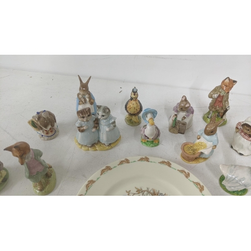 31 - A group of Beatrix Potter, Beswick and Royal Albert models to include Jemima Puddleduck, Foxy Whiske... 