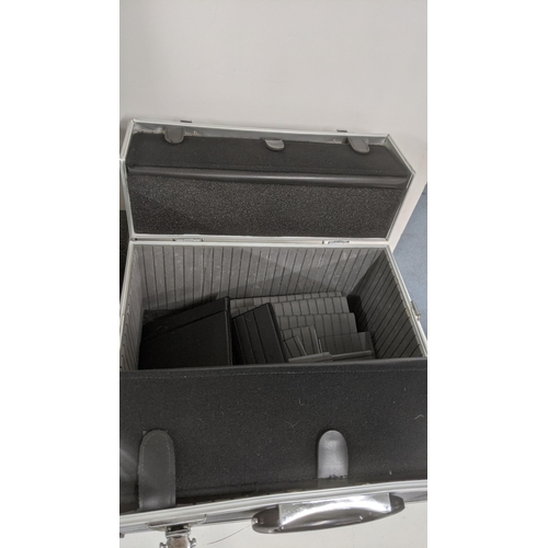 34 - A set of travel cases to include three aluminium examples and one other with aluminium edges and two... 