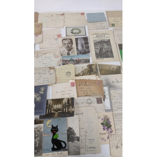 39 - A large quantity of 19th century and later ephemera to include silk postcards, handmade cards, ware ... 