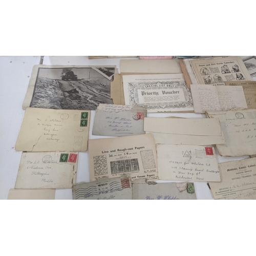 39 - A large quantity of 19th century and later ephemera to include silk postcards, handmade cards, ware ... 