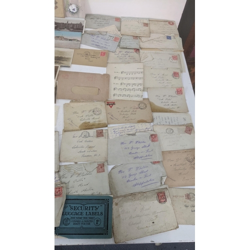 39 - A large quantity of 19th century and later ephemera to include silk postcards, handmade cards, ware ... 