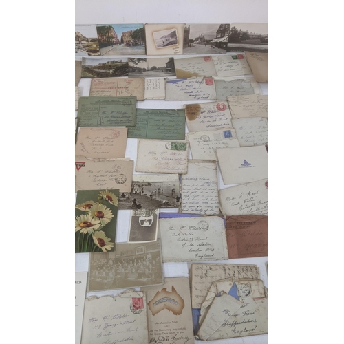 39 - A large quantity of 19th century and later ephemera to include silk postcards, handmade cards, ware ... 