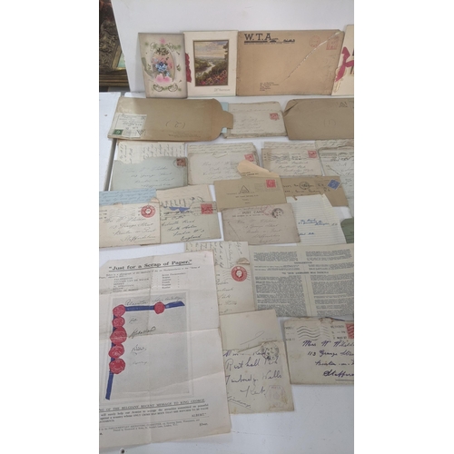 39 - A large quantity of 19th century and later ephemera to include silk postcards, handmade cards, ware ... 