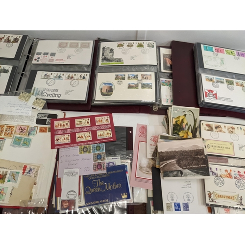 25 - Postage stamps, pre and post 1920 postcards, First Day covers, a collection of pennies, foreign coin... 