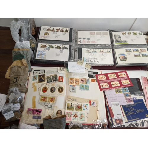 25 - Postage stamps, pre and post 1920 postcards, First Day covers, a collection of pennies, foreign coin... 