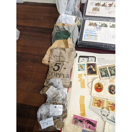 25 - Postage stamps, pre and post 1920 postcards, First Day covers, a collection of pennies, foreign coin... 