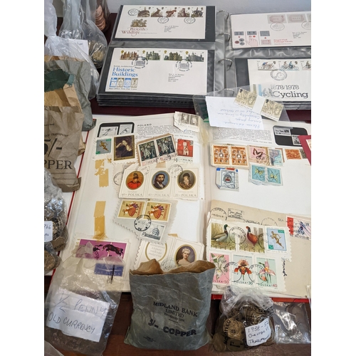 25 - Postage stamps, pre and post 1920 postcards, First Day covers, a collection of pennies, foreign coin... 