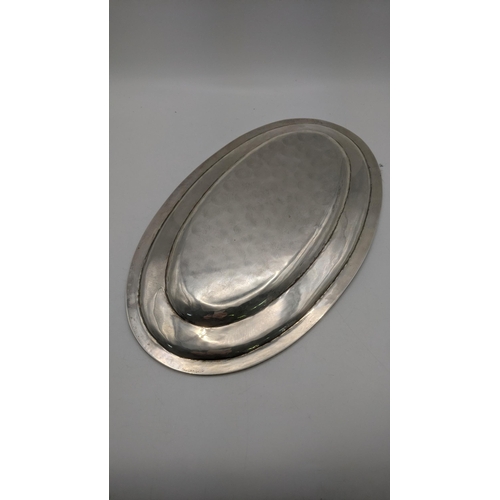 66 - A silver oval dish with rope cast rim 25 cm x 17 cm, 329.5g, stamped 925
Location: BRL
If there is n... 