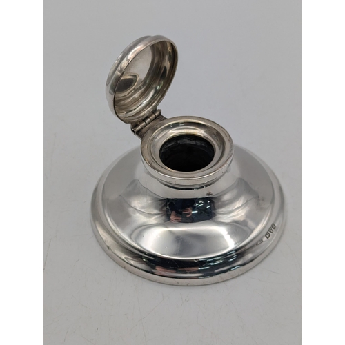 117 - A silver Capstan inkwell and whistle, hallmarked London 1911
Location: BRR
If there is no condition ... 