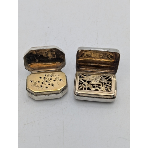 118 - Two silver vinaigrettes, both having gilt interiors to include an example with engraved decoration t... 