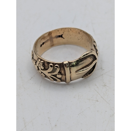 78 - A 9ct yellow gold buckle ring, size O, 6.2g Location: C2
If there is no condition report shown, plea... 