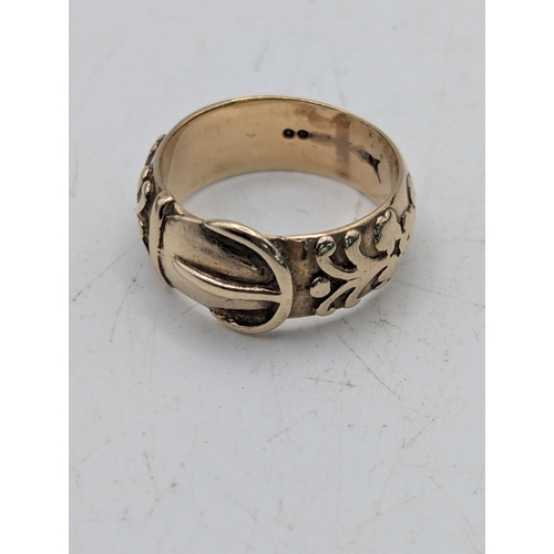 78 - A 9ct yellow gold buckle ring, size O, 6.2g Location: C2
If there is no condition report shown, plea... 