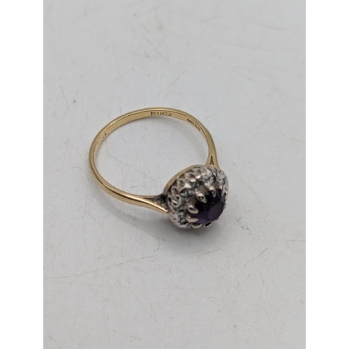 84 - An 18ct yellow and white gold amethyst and diamond halo ring size N, 3.2g Location: R2
If there is n... 