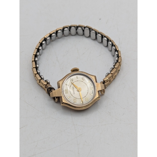 86 - A Vertex 9ct yellow gold cased ladies wristwatch on a gold plated expanding bracelet Location: C2
If... 