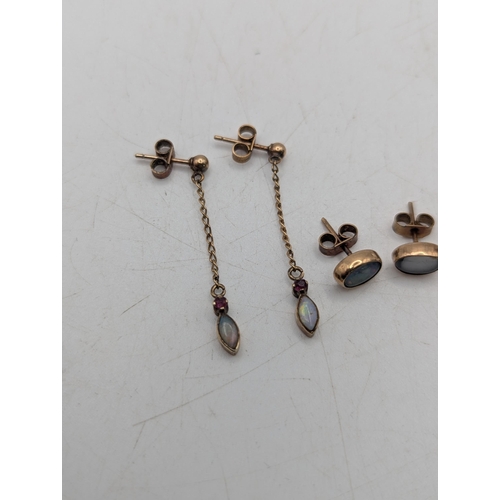 94 - A selection of gold, yellow metal to include a pair of 9ct sapphire and paste stone examples, a pair... 