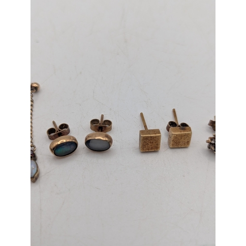 94 - A selection of gold, yellow metal to include a pair of 9ct sapphire and paste stone examples, a pair... 