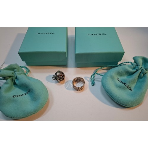 3 - Tiffany & Co- A Paloma Picasso silver ring with heart design together with a white metal filigree pe... 