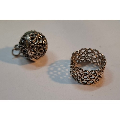 3 - Tiffany & Co- A Paloma Picasso silver ring with heart design together with a white metal filigree pe... 