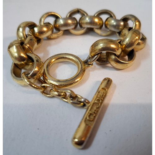 2 - Christian Dior- A gold tone large open belcher chain bracelet (box not included, display only). Loca... 