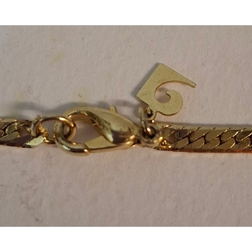 5 - YSL- A small lot comprising an Yves Saint Laurent gold tone leaf brooch, a gold tone Nina Ricci flor... 