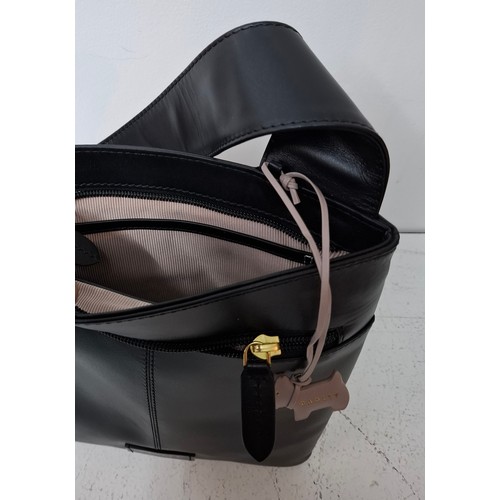 22 - Radley- Two modern black leather bags comprising a handbag with branded dust-bag and 2 detachable bl... 