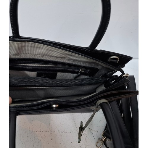 22 - Radley- Two modern black leather bags comprising a handbag with branded dust-bag and 2 detachable bl... 