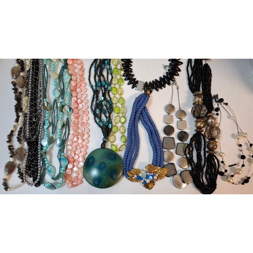 50 - A quantity of 1970's and later bead necklaces and bracelets to include Aurora Borealis necklaces, fa... 