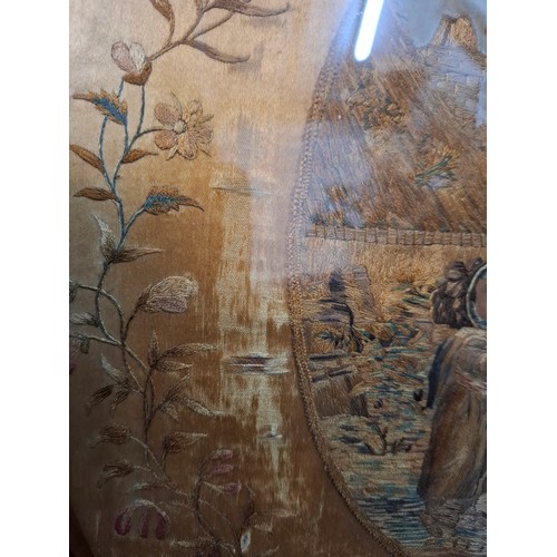31 - A Georgian silk and embroidered ebony framed picture of a mother and child 28.5cm wide x 36cm high b... 