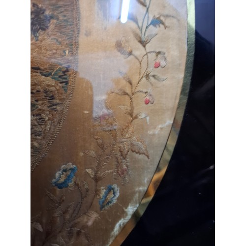 31 - A Georgian silk and embroidered ebony framed picture of a mother and child 28.5cm wide x 36cm high b... 