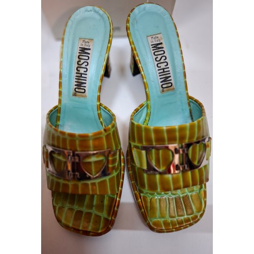 16 - Moschino-A pair of Jenner Coco Turchese peep toe heeled sandals, European size 37 with branded shoe ... 
